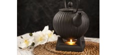 Chauffe Théière en Fonte
